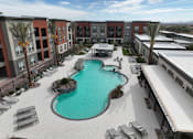 Thumbnail 10 of 108 - Aerial Pool View at The Maddox Luxury Apartment Homes, Buckeye, AZ