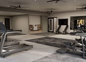 Thumbnail 5 of 48 - A modern home gym with treadmills and exercise equipment.