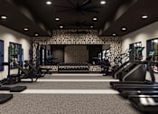Thumbnail 2 of 16 - A gym with treadmills, elliptical machines, and a wall of windows at The Logan Luxury Apartments, Nampa, Idaho