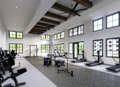 Thumbnail 6 of 16 - A spacious gym with a variety of equipment at Terrassa Luxury Apartments, Florida