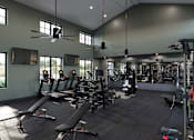Thumbnail 3 of 31 - A gym with a variety of equipment including treadmills, weights, and exercise machines.