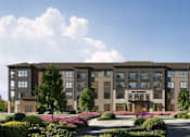Thumbnail 4 of 4 - A large, modern building with a landscaped front yard.