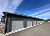 Thumbnail 56 of 88 - a garage with a row of garage doors and a blue sky at The Depot, Missouri