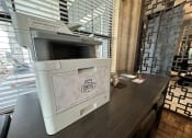 Thumbnail 56 of 56 - a printer in a hotel room in front of a window at Watermark at Steele Crossing, Fayetteville, AR