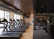 Thumbnail 4 of 45 - Gym with treadmills at The Union Flats at Fishers District, Fishers, IN