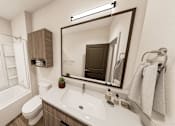 Thumbnail 10 of 19 - White Bathroom at Heritage on Hover Apartments, Longmont, 80503