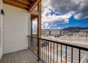 Thumbnail 41 of 46 - Balcony with view of parking lot and mountains  at Alta25, Monument, 80132