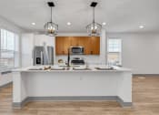 Thumbnail 41 of 58 - a kitchen with a large counter top and a sink at Meridian at CityPlace, Minnesota, 55125