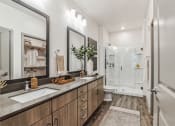 Thumbnail 3 of 30 - a bathroom with two sinks and a shower at Canter, Ocala, Florida