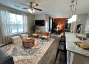 Thumbnail 34 of 56 - the view of the living room from the kitchen at Watermark at Steele Crossing, Fayetteville