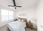 Thumbnail 10 of 21 - A bedroom with a bed, nightstand, and a ceiling fan.