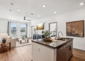 Thumbnail 40 of 40 - a view of the lobby of a building with a large staircase  at Stella Luxury Apartment Homes, Arizona, 85143