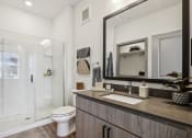 Thumbnail 8 of 40 - a bathroom with a sink and a toilet and a shower at Stella, San Tan Valley Arizona