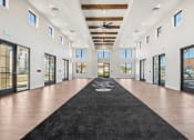 Thumbnail 23 of 40 - lobby with black carpet and windows at Stella, San Tan Valley Arizona