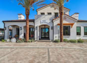 Thumbnail 20 of 40 - a white building with palm trees in front of it at Stella, San Tan Valley, AZ 85143