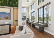 Thumbnail 35 of 49 - living room with a couch and a pool table at Drift, Daytona Beach, FL, 32117