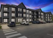 Thumbnail 4 of 31 - a rendering of a large apartment building with cars parked in front of it  at Prism at Diamond Ridge, Pennsylvania, 15108