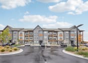 Thumbnail 56 of 56 - an exterior view of an apartment building with cars parked in a parking lot at Notch66, Longmont, Colorado