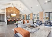 Thumbnail 35 of 56 - a living room with a couch and a table at Notch66, Longmont, Colorado