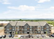 Thumbnail 50 of 56 - an aerial view of an apartment building and parking lot at Notch66, Longmont, Colorado