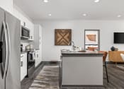 Thumbnail 6 of 56 - a kitchen with stainless steel appliances and a counter top at Notch66, Longmont, Colorado