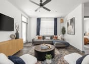 Thumbnail 17 of 56 - a living room with a couch and a ceiling fan at Notch66, Longmont, Colorado
