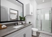 Thumbnail 20 of 56 - a bathroom with a large mirror and a toilet and a shower at Notch66, Longmont, Colorado