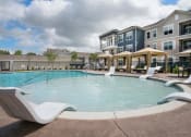Thumbnail 12 of 56 - Pool With Sundecks at Watermark at Steele Crossing, Arkansas, 72703