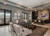 Thumbnail 55 of 56 - a living room with a couch and chairs and a tv at Watermark at Steele Crossing, Arkansas, 72703