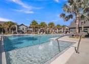 Thumbnail 8 of 30 - resort style swimming pool with palm trees at Canter, Florida, 34474