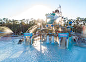 Thumbnail 115 of 124 - Pirate themed splash pad with slides and fountains at Velara Luxury Apartments, Florida