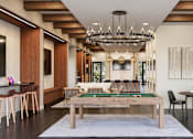 Thumbnail 9 of 18 - A room with a pool table and a bar area at The Stadler Luxury Apartments, Florida 34210