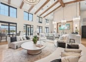 Thumbnail 25 of 53 - a living room with couches and chairs and a table at The Garrison Luxury Apartment Homes, Colorado