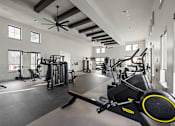 Thumbnail 21 of 115 - A spacious gym with a variety of equipment including treadmills, weights, and a rowing machine. at Terrassa Luxury Apartments, St. Augustine