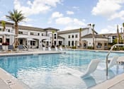 Thumbnail 80 of 115 - Pool With Sun Loungers at Terrassa Luxury Apartments, St. Augustine, Florida