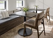 Thumbnail 23 of 115 - A modern dining room with a glass table and chairs. at Terrassa Luxury Apartments, St. Augustine, Florida
