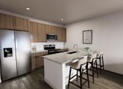 Thumbnail 16 of 16 - A modern kitchen with a refrigerator, microwave, oven, sink, and a dining table with chairs.