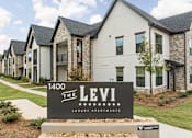 Thumbnail 2 of 59 - Welcoming Property Signage at The Levi Luxury Apartments, McDonough
