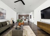 Thumbnail 36 of 59 - Living Room With Kitchen at The Levi Luxury Apartments, McDonough