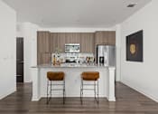 Thumbnail 37 of 59 - Island Kitchen at The Levi Luxury Apartments, McDonough, 30253