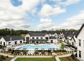 Thumbnail 13 of 59 - Large Pool With Relaxing Chairs at The Levi Luxury Apartments, Georgia, 30253