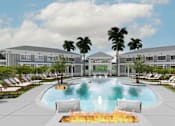 Thumbnail 3 of 13 - A pool with a fire in the middle of it at Verity Luxury Apartment Homes Apartments, Florida, 32960