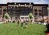 Thumbnail 12 of 45 - A group of people are standing in front of a building with a sign at The Union Flats at Fishers District, Fishers, IN 46037