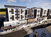 Thumbnail 2 of 45 - A rendering of a modern apartment complex at The Union Flats at Fishers District, Indiana