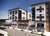 Thumbnail 45 of 45 - A modern apartment complex with a mix of residential and commercial spaces at The Union Flats at Fishers District, Fishers, IN