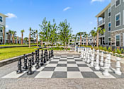 Thumbnail 17 of 64 - Outdoor Chess Game at The Quinn Luxury Apartments, Florida
