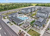 Thumbnail 10 of 64 - Drone Pool View at The Quinn Luxury Apartments, Florida