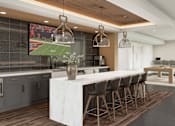Thumbnail 3 of 34 - A modern kitchen with a long white marble island and dark wood floors. at Stack at Wheat Ridge Apartments, Wheat Ridge