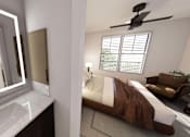 Thumbnail 28 of 34 - A bedroom with a bed, a mirror, and a ceiling fan at Stack at Wheat Ridge Apartments, Wheat Ridge, Colorado