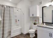 Thumbnail 15 of 38 - our apartments offer a bathroom with a bathtub  at Upland Flats, Colorado, 80922